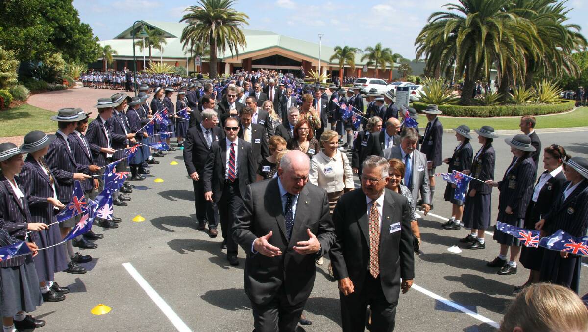 Australia's Governor-General Sir Peter Cosgrove and Sheldon College Board Chairman Don Seccombe  move to the Sheldon College $15 million Learning and Innovation for a New Queensland  education centre on Friday. Photo Chris McCormack 