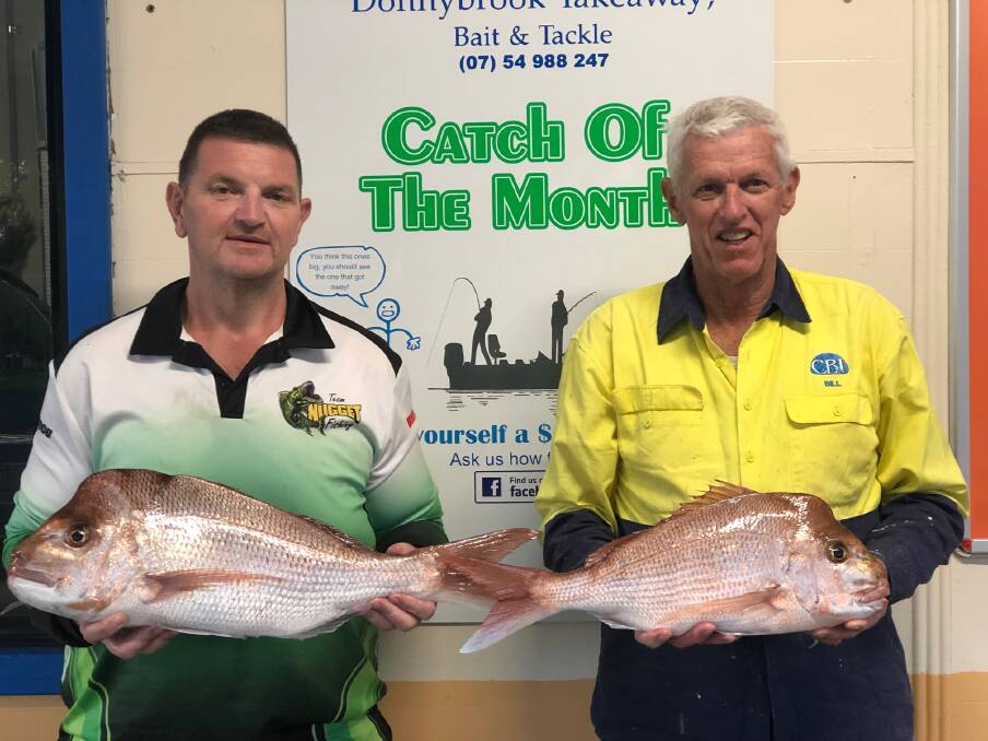 WORTH THEIR WEIGHT: Bill Groth and Len Thorley weighed in snapper from Pumicestone Passage at Donnybrook Bait and Tackle.