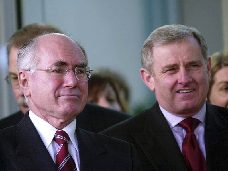 John Howard has paid tribute to former political adversary Simon Crean following his sudden death. (Alan Porritt/AAP PHOTOS)