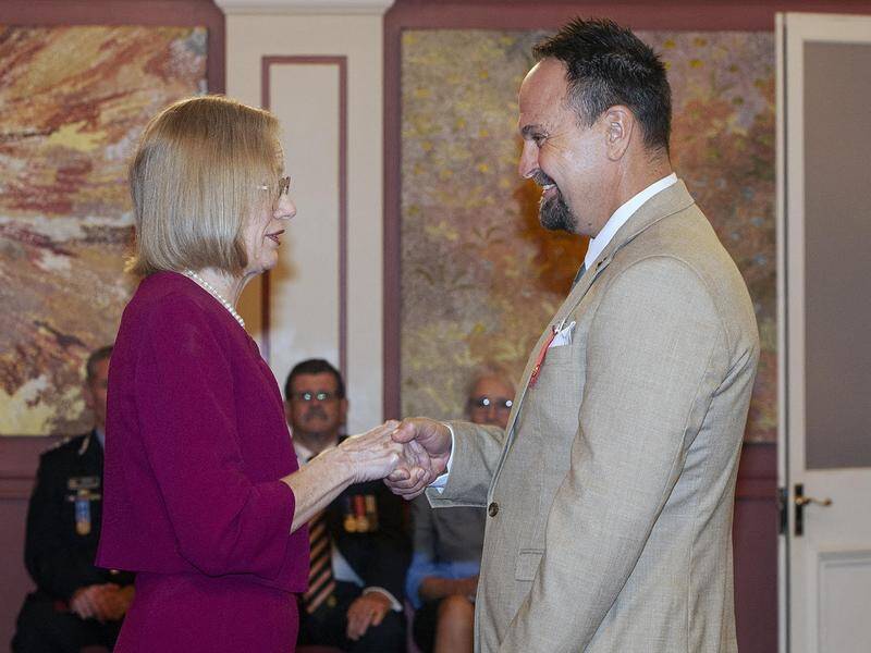 Steven Bradbury has been honoured with a bravery award from Queensland Governor Jeannette Young. (Stu Riley Photography/AAP PHOTOS)