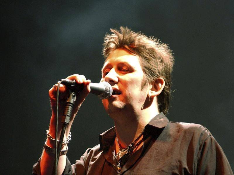 Shane MacGowan, hard-drinking poet of The Pogues, dies at 65