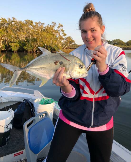 Happy angler: Tanisha Hutchinson happy with the 40-centimetre trevally she caught from the South Pine River at Bald Hills